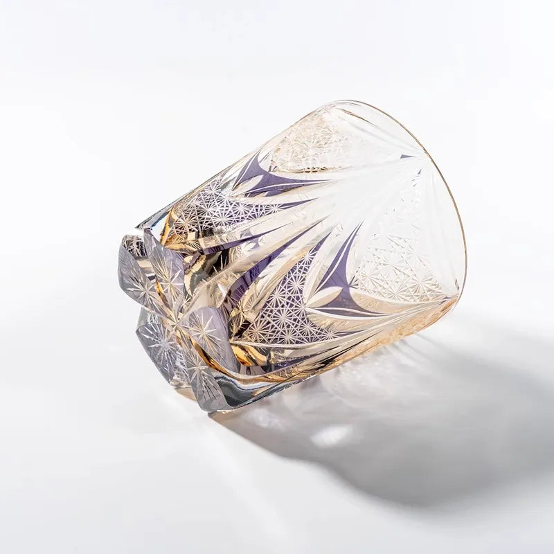 Edo Kiriko Amethyst Dawn whisky glass lying on side with pale purple crystal cuts