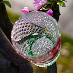 Top detail of Edo Kiriko Kingyo Nishiki whisky glass showing dense cut crystal and green base