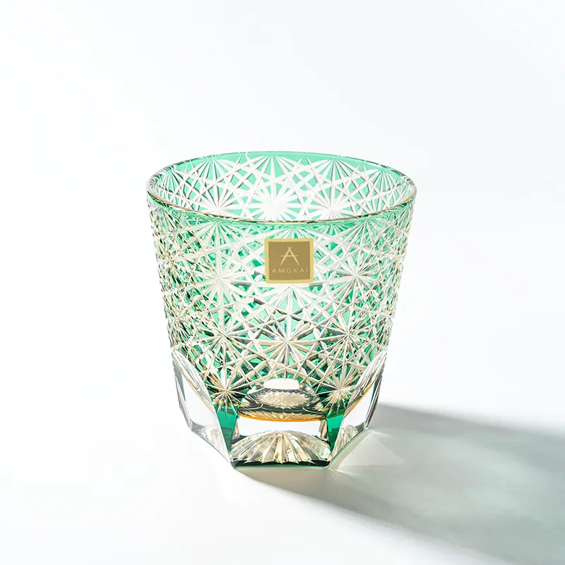 Edo Kiriko Emerald Starburst whisky glass front view with pale green geometric cuts