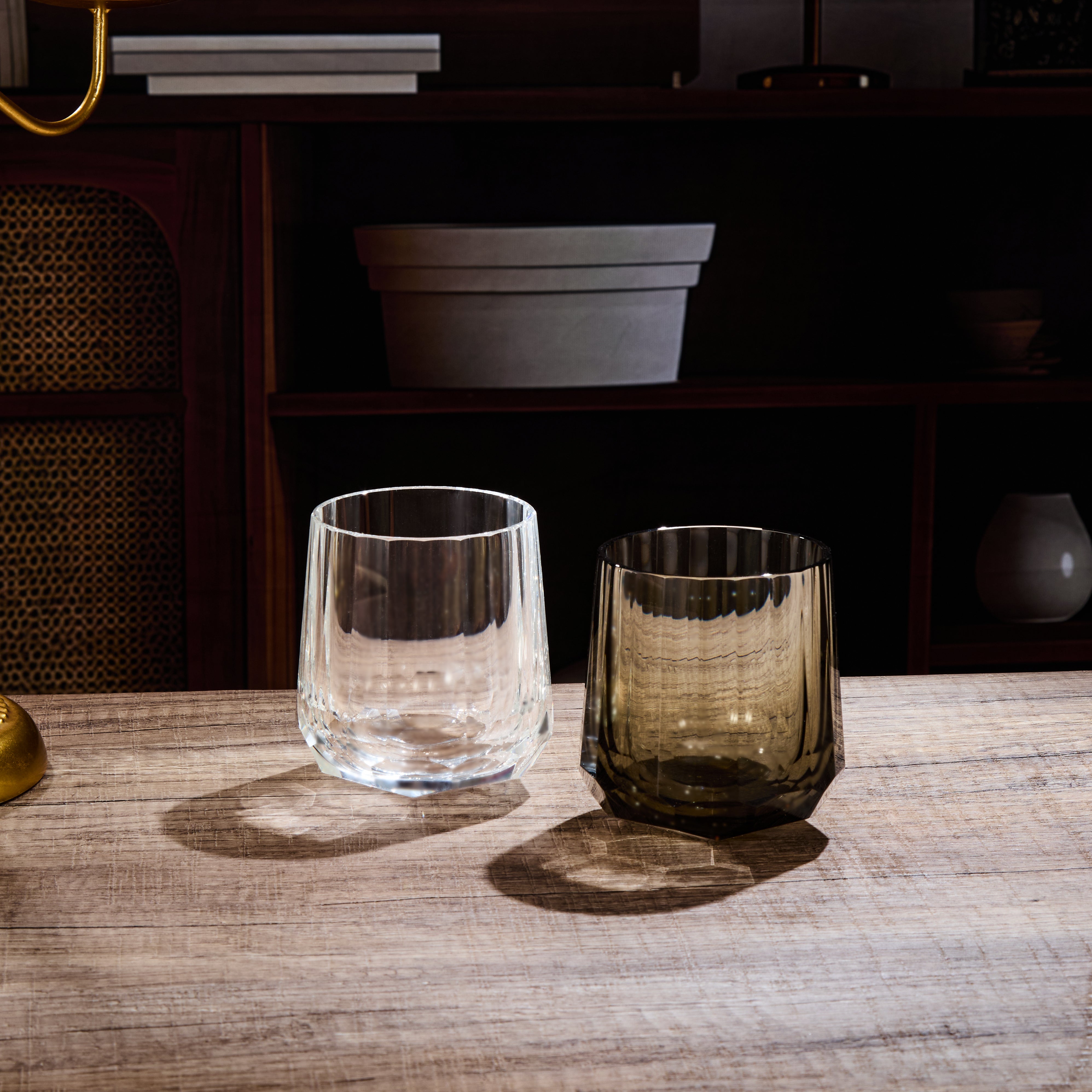 Edo Kiriko Kage-Tate whisky glasses on wooden table with clear and smoky crystal bodies