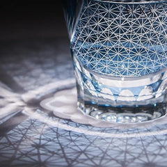 Edo Kiriko Red Chrysanthemum blue whisky glass close-up with geometric cut pattern