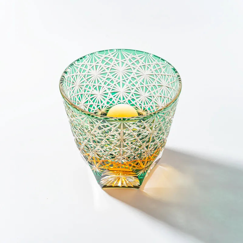 Edo Kiriko Emerald Starburst whisky glass top view showing pale green cut crystal pattern