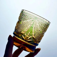 Edo Kiriko Sparkling Galaxy whisky glass held in hand showing geometric cut pattern