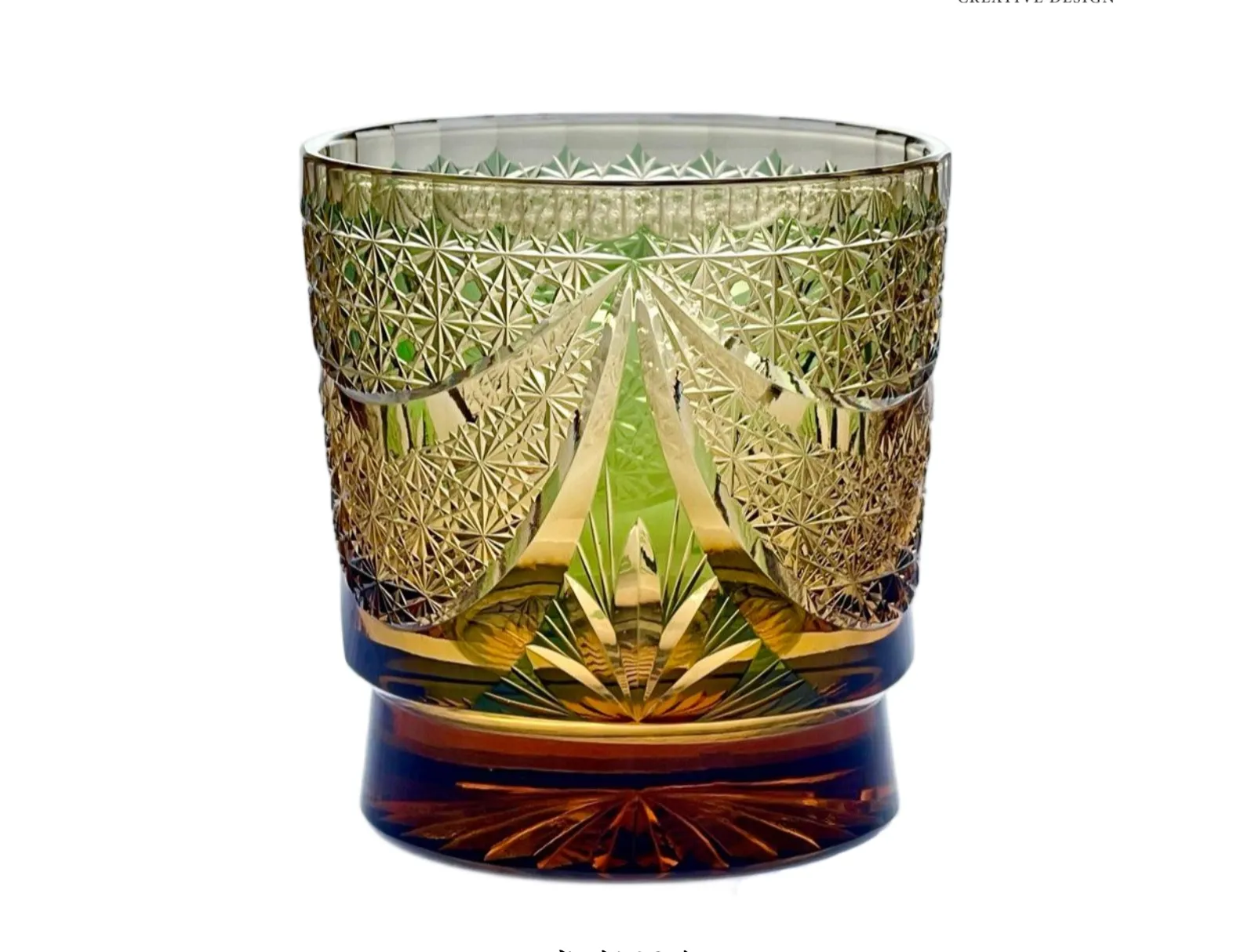 Edo Kiriko Sparkling Galaxy whisky glass front view with green and gold cut crystal pattern