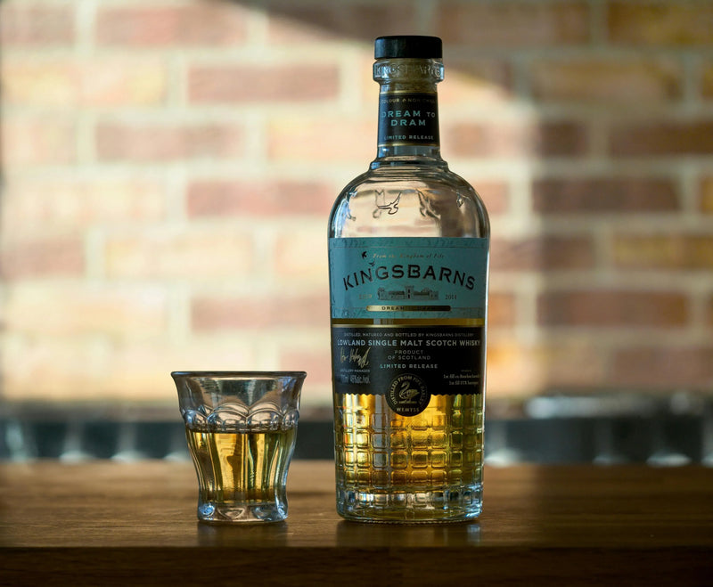 Edo Kiriko whisky glass beside whisky bottle for whiskey glass buying guide