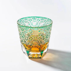 Edo Kiriko Emerald Starburst whisky glass front view with amber whisky and green cuts