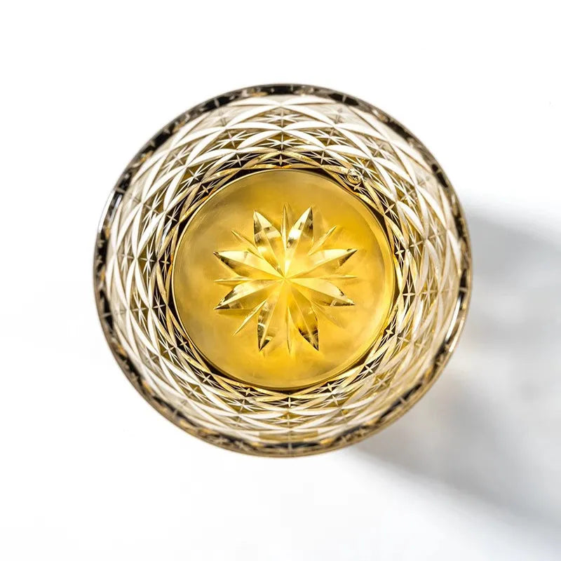 Edo Kiriko Starlight Crystal whisky glass top view showing golden starburst base