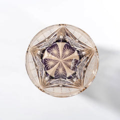 Edo Kiriko Amethyst Dawn whisky glass base view showing purple radial starburst pattern