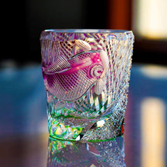 Edo Kiriko Kingyo Nishiki whisky glass with pink goldfish motif and green crystal base