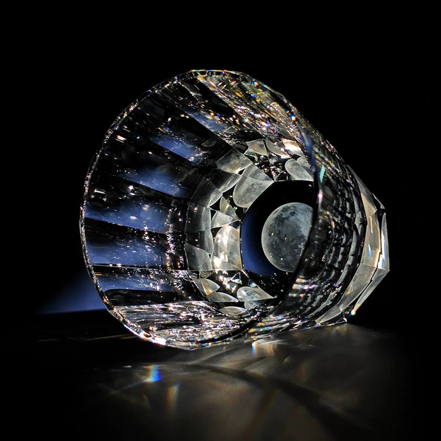 Edo Kiriko Tsukikage whisky glass angled with cut crystal walls and moon base detail