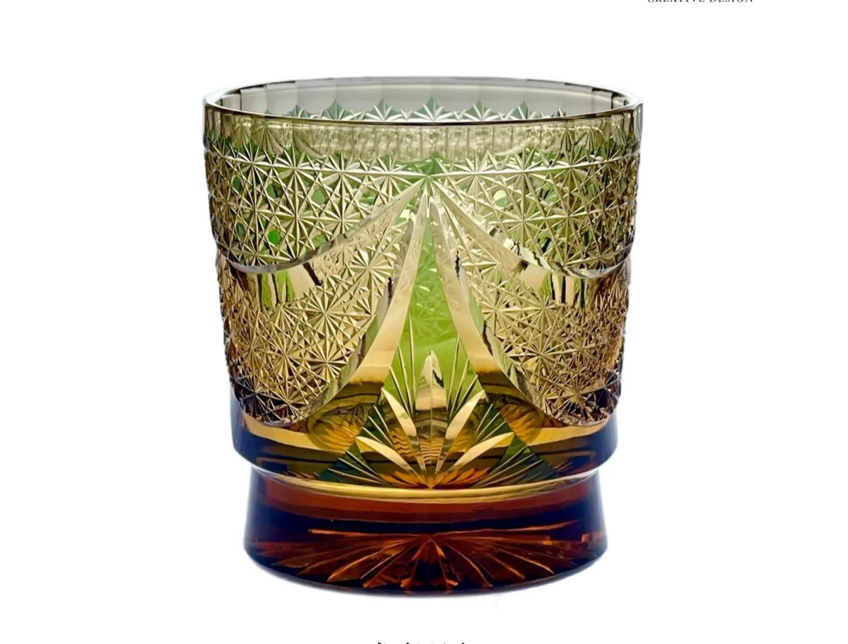 Edo Kiriko Sparkling Galaxy whisky glass front view with green and gold cut crystal pattern