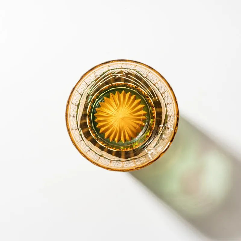 Edo Kiriko Mount Fuji Green whisky glass base view with golden radial cut detail