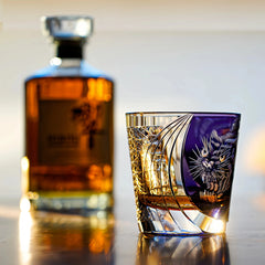 Edo Kiriko Murasaki Tora whisky glass beside whisky bottle on bar setting