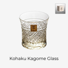 Kohaku Kagome glass on white with amber tint, crossed lattice cuts, and gold label