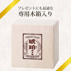 Pale wooden Kohaku glass gift box shown with Japanese text on a cream background